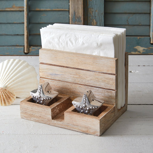 Starfish-shaped salt and pepper shakers with a boardwalk-style napkin holder, adding a coastal touch to your dining table.