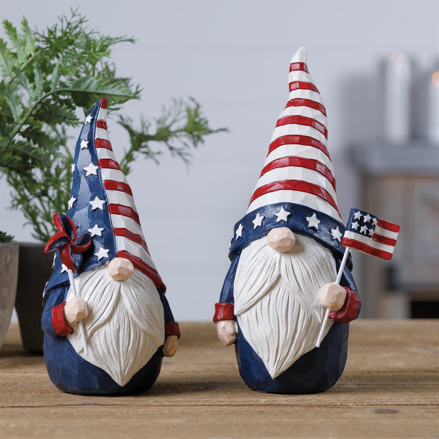 Set of two Americana gnome figurines in red, white, and blue with flag and spinner accents