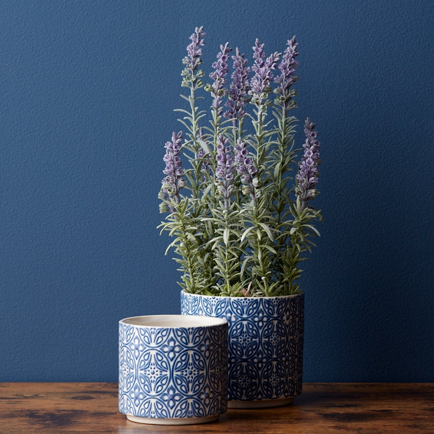 Set of two blue and white ceramic pots with geometric pattern and glossy finish for farmhouse decor