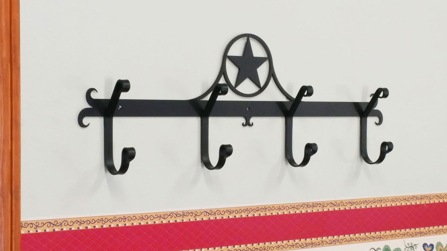 Rustic Western Star Coat Bar with four hooks, featuring a charming design for enhancing farmhouse style in any home setting.