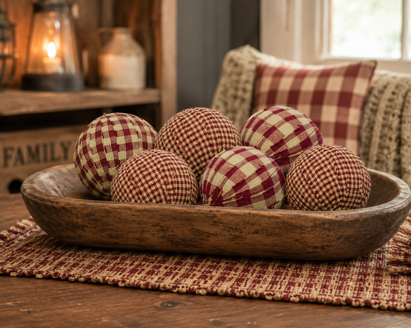 Set of 6 burgundy and tan gingham rag balls for farmhouse decor, rustic bowl filler and cozy country accent.