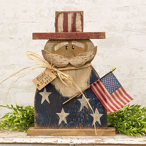 Rustic wood Uncle Sam patriotic decor with painted stars, teastained flag, and farmhouse handmade style