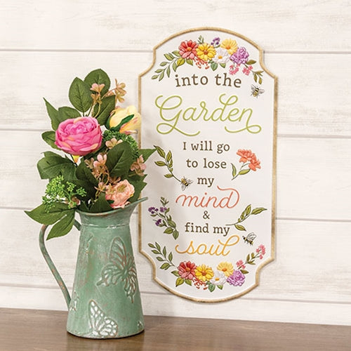 Into the Garden embossed floral metal sign with cream background, brown trim, colorful flowers, and scalloped corners.