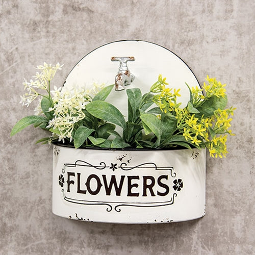 Distressed white farmhouse wall planter with arched top, rusty faux spicket, black rim, and vintage floral detailing.