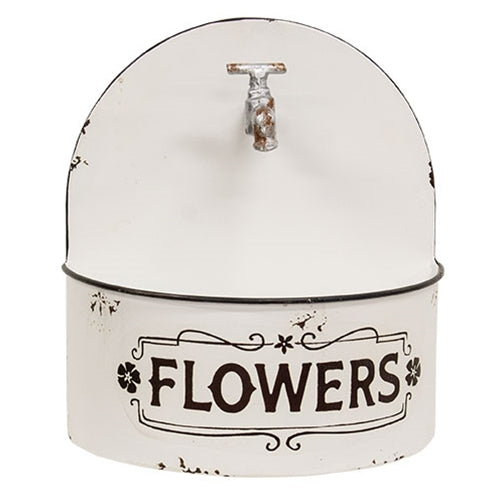 Distressed white farmhouse wall planter with arched top, rusty faux spicket, black rim, and vintage floral detailing.