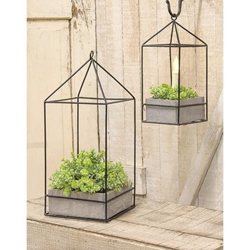 Wooden planter boxes with metal frames, showcasing plants. Plastic lining for durability, adding a natural touch to decor.