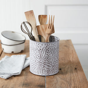 Starfish Stamped Metal Utensil Holder with coastal design, holding various kitchen utensils, adding elegance to your kitchen.
