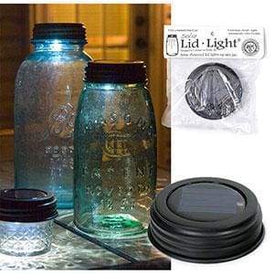 Rustic brown solar lid light on a standard Mason jar, glowing warmly in a garden setting, highlighting its versatile charm.