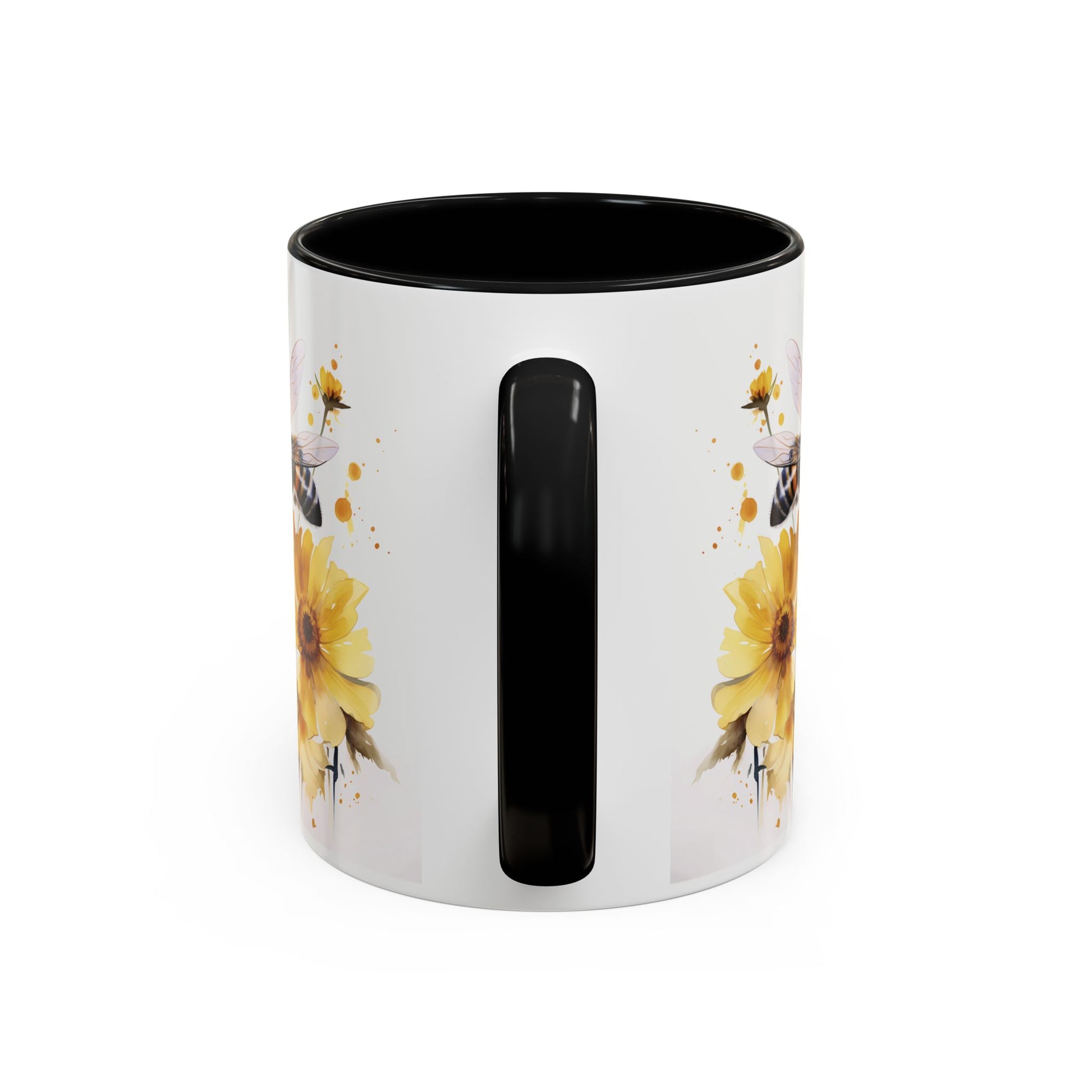 White ceramic mug with black handle and golden bee wildflower watercolor design