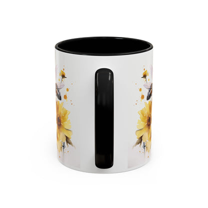White ceramic mug with black handle and golden bee wildflower watercolor design