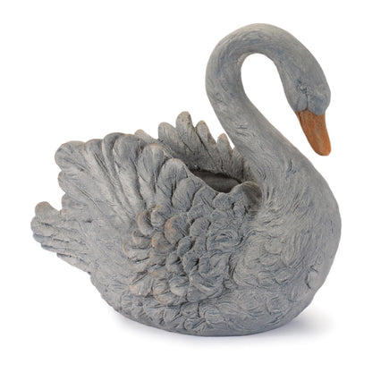 Graceful white swan planter with feathered details and curved neck for indoor or patio decor