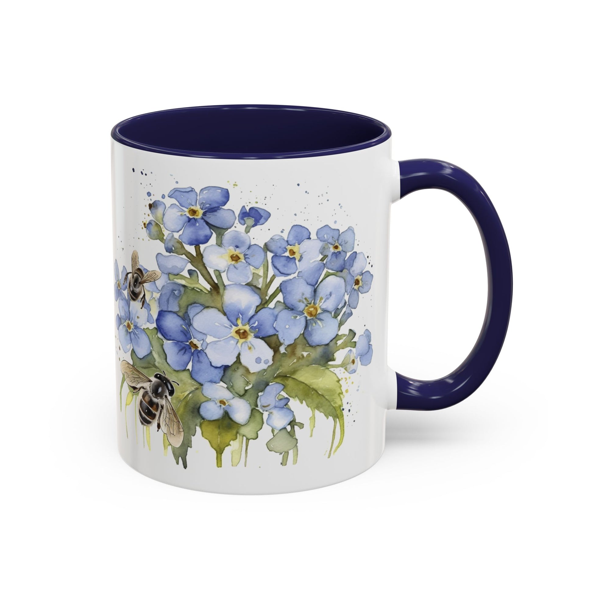 Botanical bee floral ceramic mug with soft blue flowers, tiny bees, navy handle, and cozy handcrafted look.