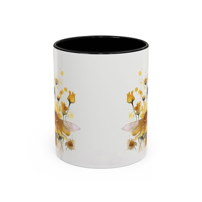 White ceramic mug with black handle and golden bee wildflower watercolor design