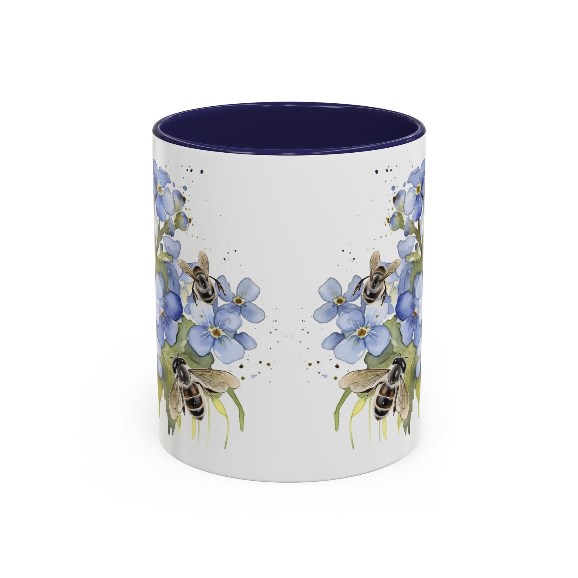 Botanical bee floral ceramic mug with soft blue flowers, tiny bees, navy handle, and cozy handcrafted look.