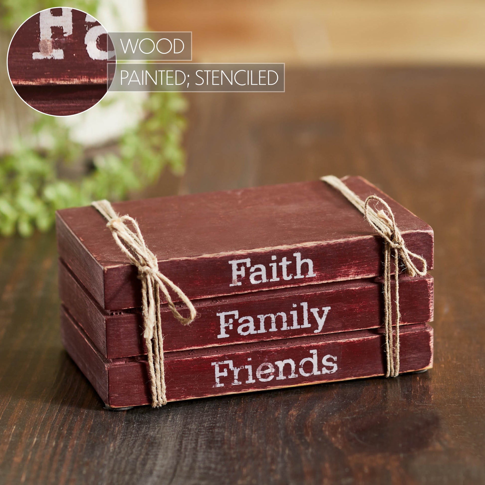 Stack of wooden blocks with 'Faith', 'Family', 'Friends' text on a wooden surface.