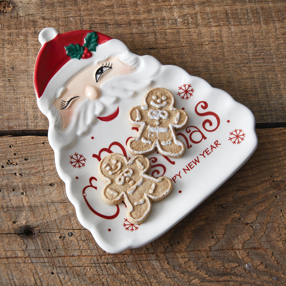 A festive dish featuring a jolly Santa Claus with a playful wink, crafted from durable dolomite for holiday charm.