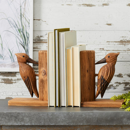 Rustic woodpecker bookends in warm brown wood grain, styled on sturdy bases for cozy farmhouse shelves.