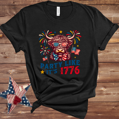 Black Patriotic Highland cow graphic T-shirt with stars-and-stripes bandana in red, white, and blue for Fourth of July fun