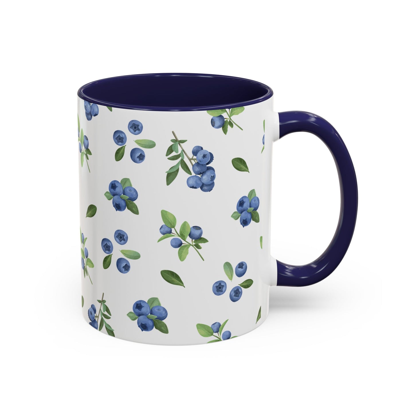 Ceramic mug with blueberry and vine pattern, white exterior, navy interior, and comfortable handle, perfect for farmhouse decor.