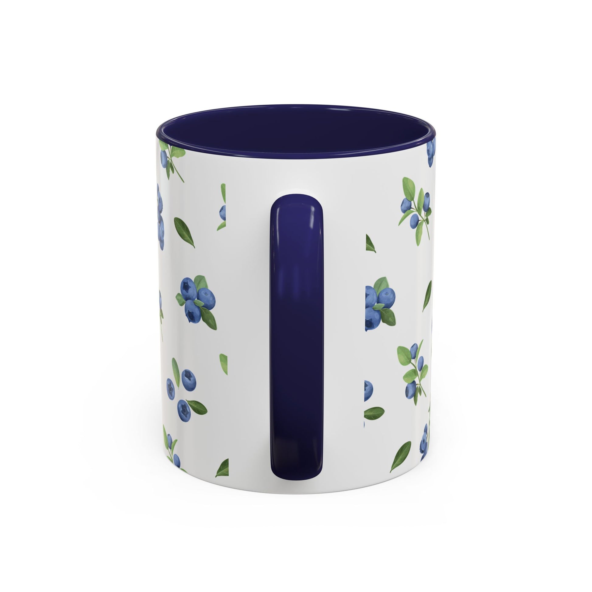 Ceramic mug with blueberry and vine pattern, white exterior, navy interior, and comfortable handle, perfect for farmhouse decor.