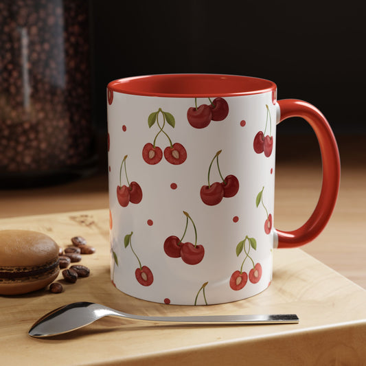 Ceramic mug with cherry motif, dotted accents, glossy finish, red handle and interior, perfect for farmhouse decor.