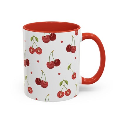 Ceramic mug with cherry motif, dotted accents, glossy finish, red handle and interior, perfect for farmhouse decor.