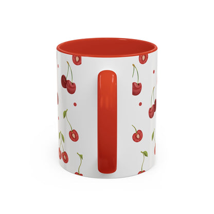 Ceramic mug with cherry motif, dotted accents, glossy finish, red handle and interior, perfect for farmhouse decor.