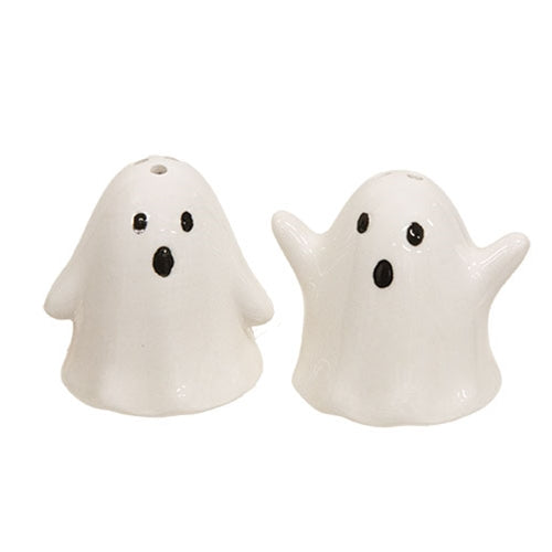 White ceramic ghost salt and pepper shakers with black eyes, a cute spooky Halloween kitchen accent