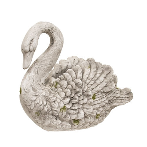 Resin swan planter with detailed feathers, distressed white-gray finish, green moss accents, and a well for floral displays.