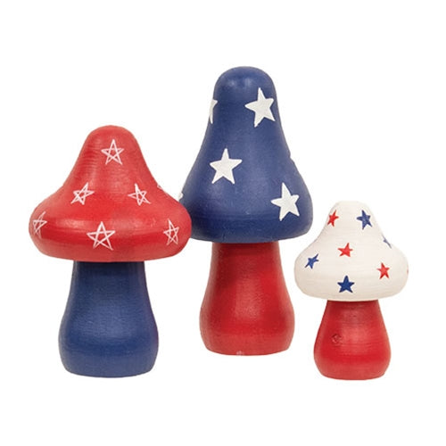 Set of 3 wooden Americana mushroom sitters with painted red, white, and blue patriotic details