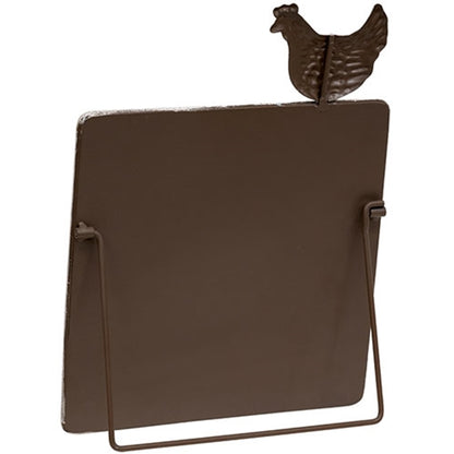 Farmhouse-style chalkboard sign with distressed white metal frame and chicken figurine, supported by a metal easel kickstand.