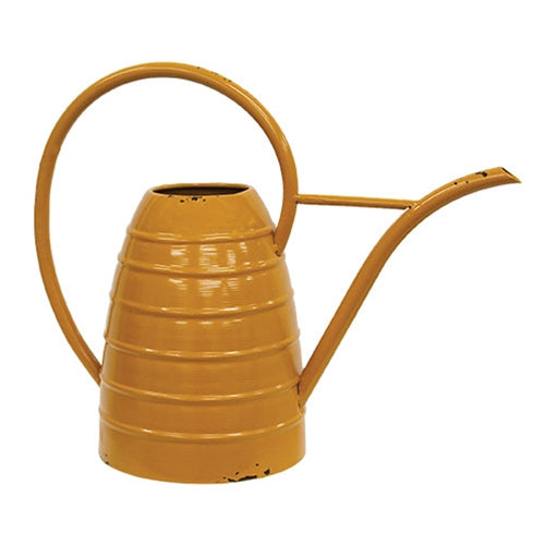 Distressed mustard metal beehive watering can with weathered finish and wraparound handle, rustic farmhouse decor