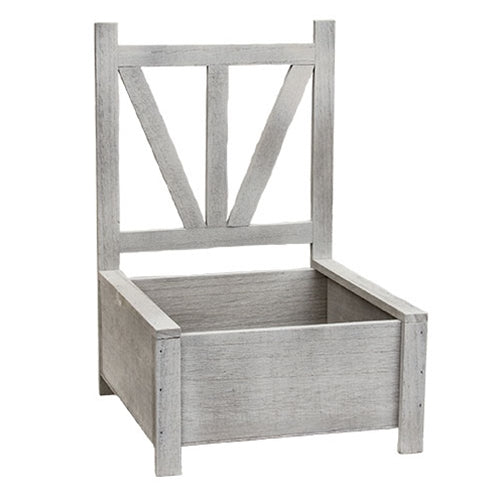 Wooden garden chair planter boxes with distressed whitewash finish, featuring open box base and detailed chairback design.
