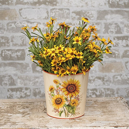 Cream metal bucket with orange rims, sunflower and berry design, and galvanized interior for fall decor