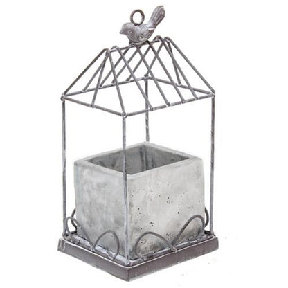 Graywash metal birdcage with cement planter, featuring a bird finial and loop for hanging, perfect for floral displays.