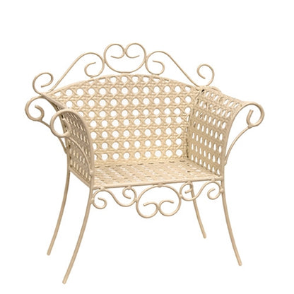 Cream-colored metal garden chair planter stand with lattice design, vintage style, and swirling flourishes on curved legs.