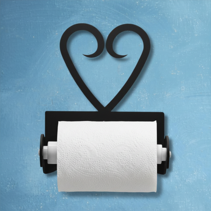 Black heart-shaped paper towel holder with a roll of white paper towels on a blue background