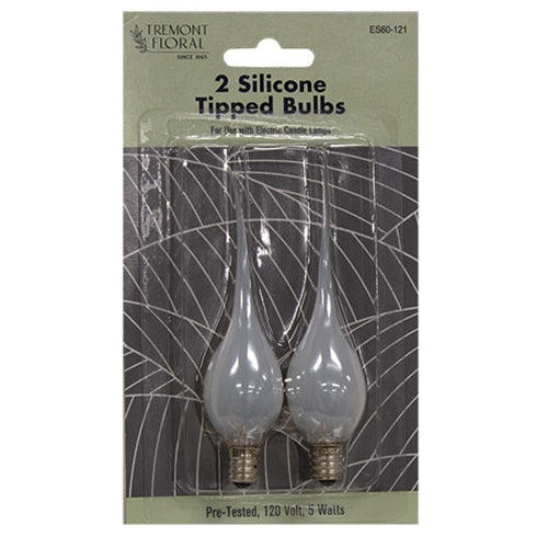 Four clear silicone-coated lightbulbs with candelabra silver screw bases and dipped peak tops, perfect for electric candles.