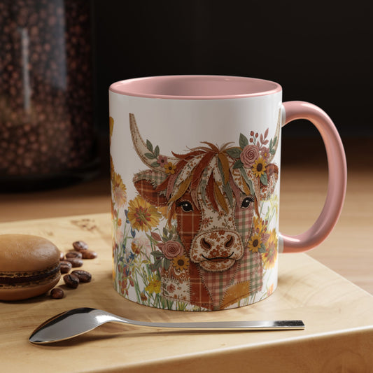 Patchwork highland cow ceramic mug with floral cottagecore design and blush pink handle