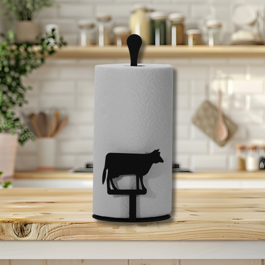 Paper towel holder with cow design on a kitchen counter