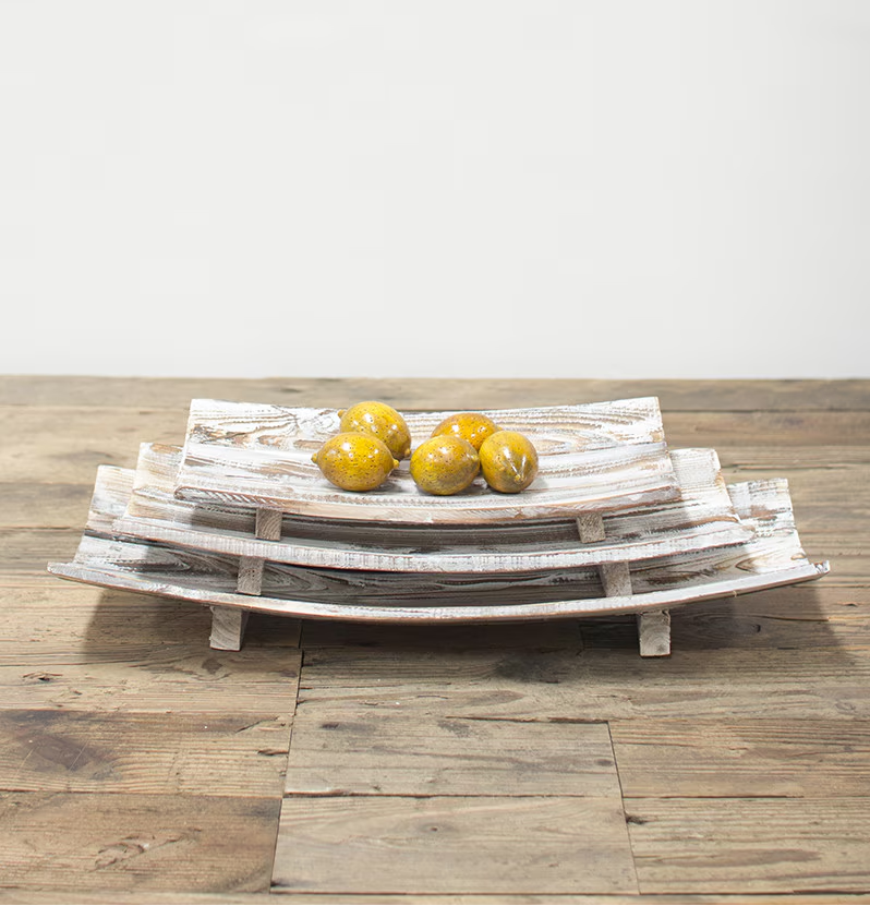 Set of three driftwood trays with a sun-bleached finish, perfect for adding coastal charm to any room; versatile and decorative.