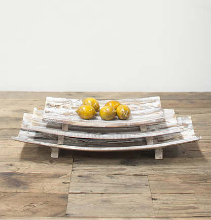 Set of three driftwood trays with a sun-bleached finish, perfect for adding coastal charm to any room; versatile and decorative.