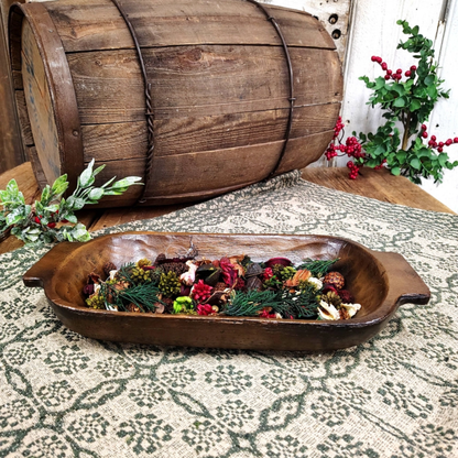 Dark wood farmhouse dough bowl with hand-carved look, rectangular shape, and decorative side handles