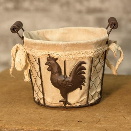 Rooster Wire Basket with chicken wire, rooster cutouts, linen lining with lace, bows, and wooden-handled grips for easy carrying.